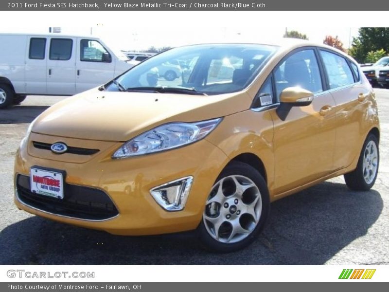 Yellow Blaze Metallic Tri-Coat / Charcoal Black/Blue Cloth 2011 Ford Fiesta SES Hatchback
