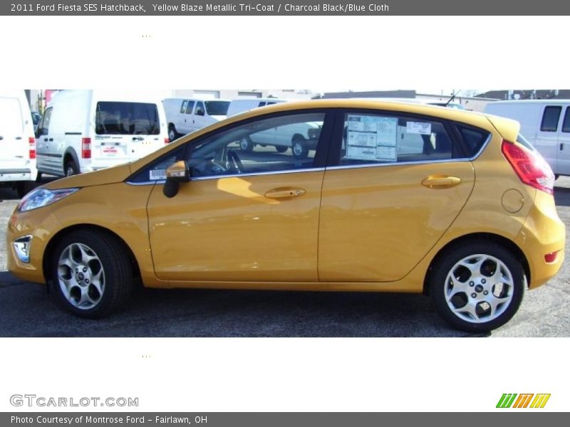 Yellow Blaze Metallic Tri-Coat / Charcoal Black/Blue Cloth 2011 Ford Fiesta SES Hatchback