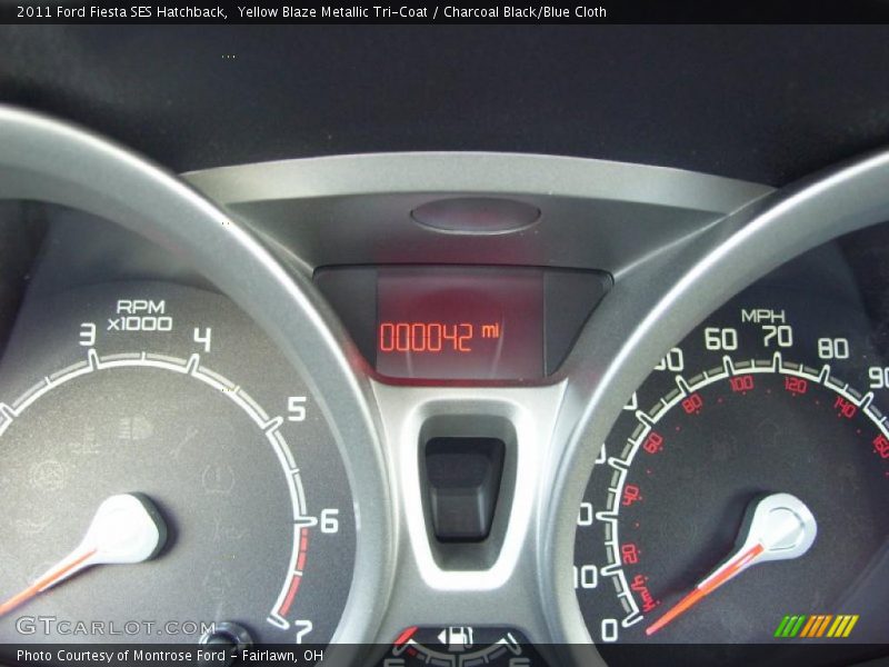 Yellow Blaze Metallic Tri-Coat / Charcoal Black/Blue Cloth 2011 Ford Fiesta SES Hatchback