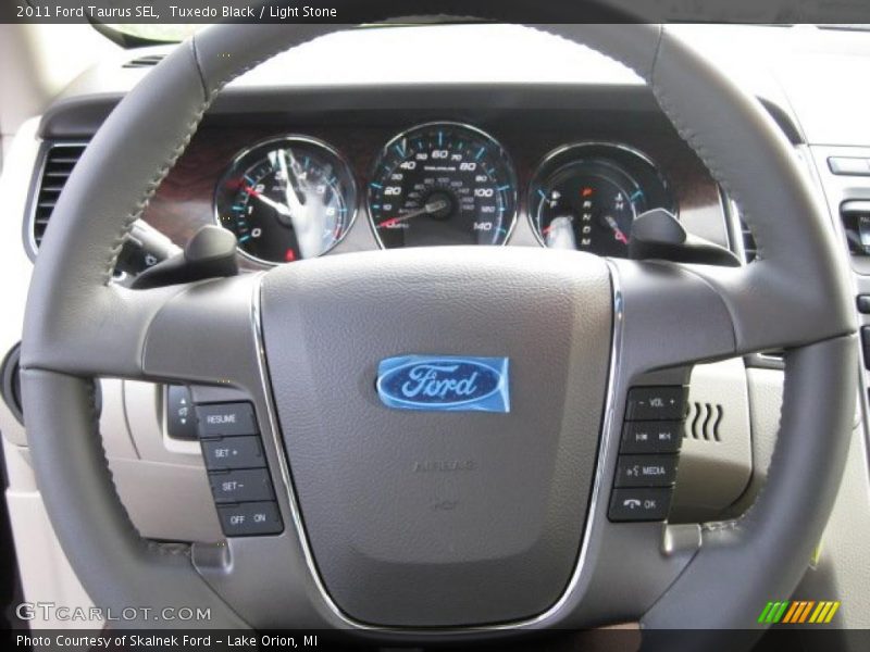 Tuxedo Black / Light Stone 2011 Ford Taurus SEL