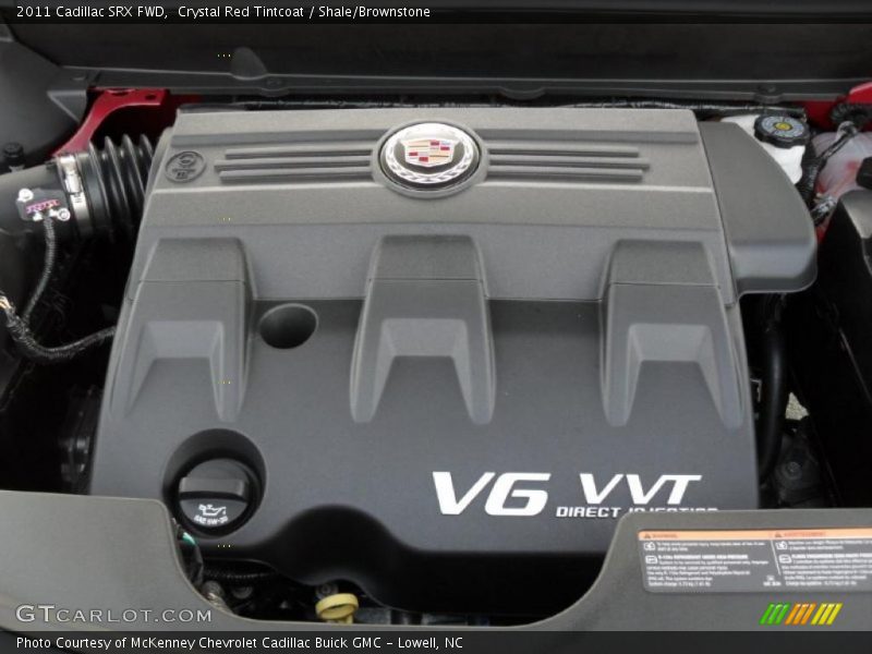 Crystal Red Tintcoat / Shale/Brownstone 2011 Cadillac SRX FWD