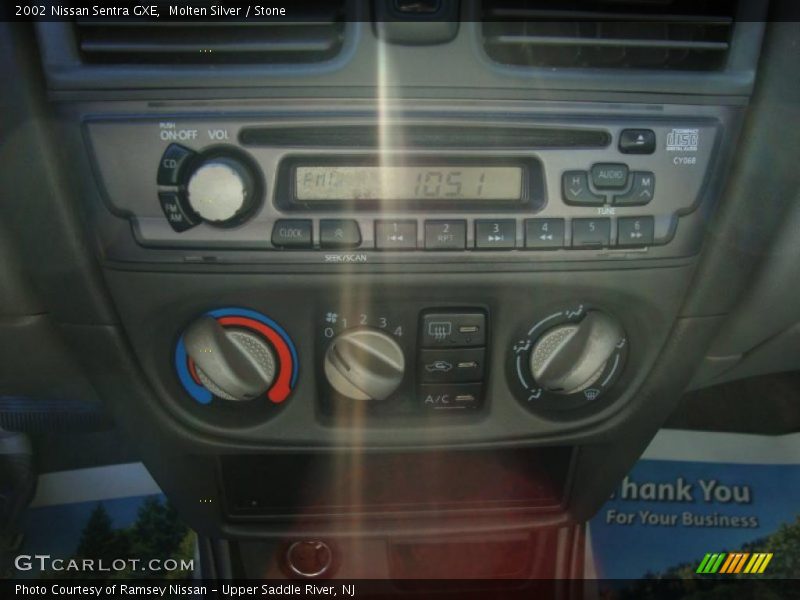 Molten Silver / Stone 2002 Nissan Sentra GXE