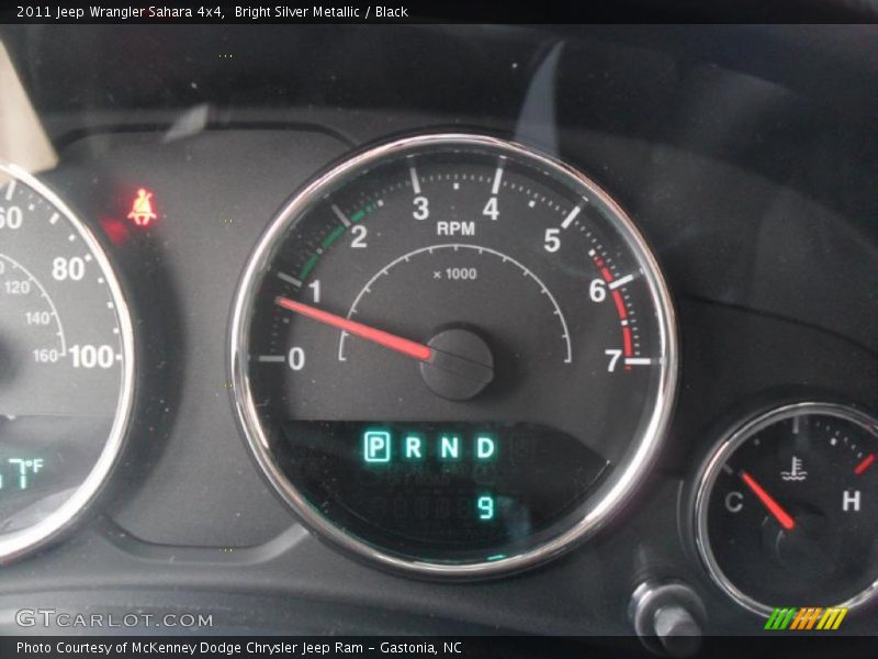 Bright Silver Metallic / Black 2011 Jeep Wrangler Sahara 4x4