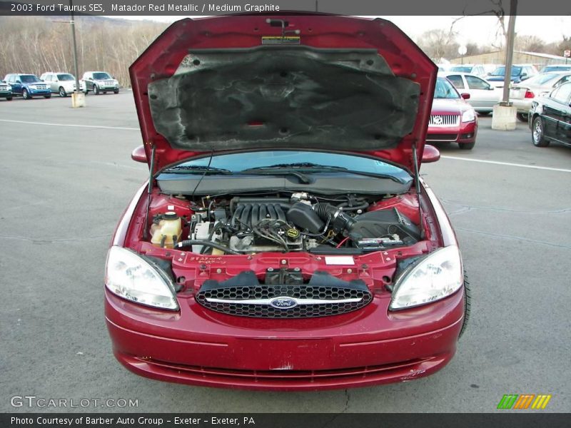 Matador Red Metallic / Medium Graphite 2003 Ford Taurus SES