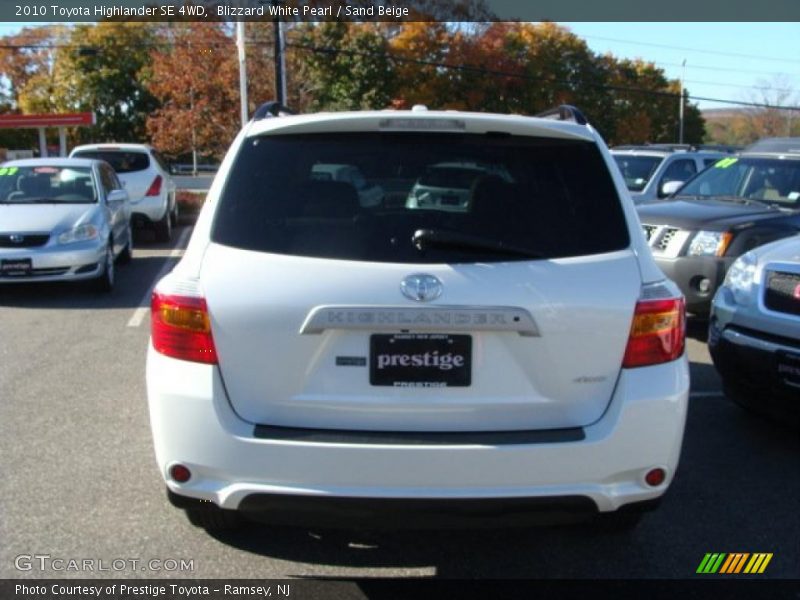Blizzard White Pearl / Sand Beige 2010 Toyota Highlander SE 4WD