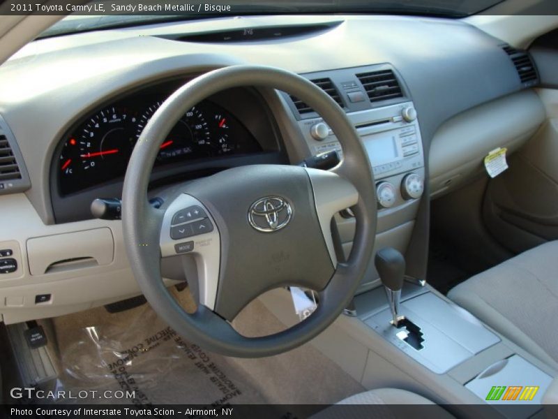 Sandy Beach Metallic / Bisque 2011 Toyota Camry LE