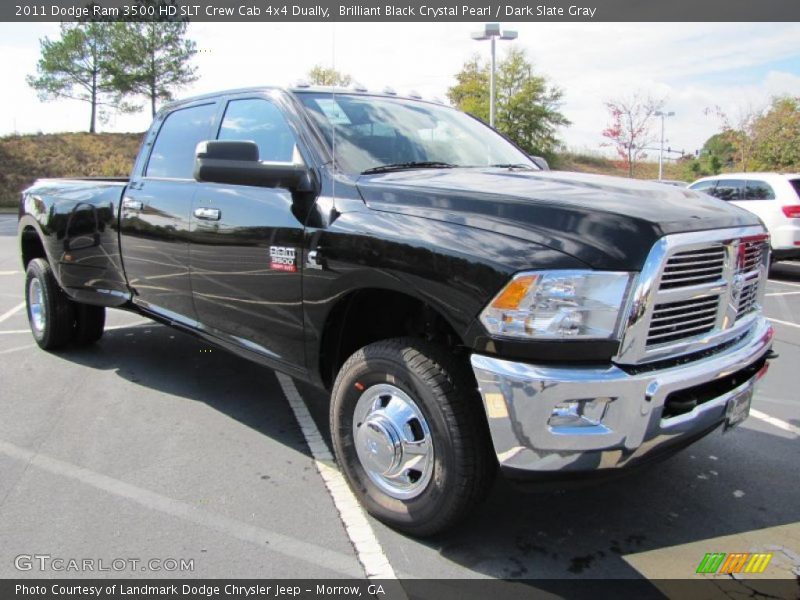 Front 3/4 View of 2011 Ram 3500 HD SLT Crew Cab 4x4 Dually