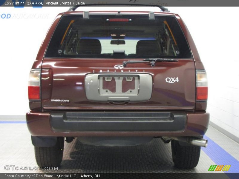 Ancient Bronze / Beige 1997 Infiniti QX4 4x4