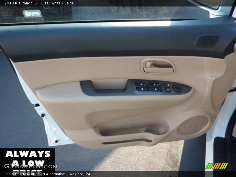Clear White / Beige 2010 Kia Rondo LX