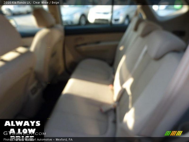 Clear White / Beige 2010 Kia Rondo LX
