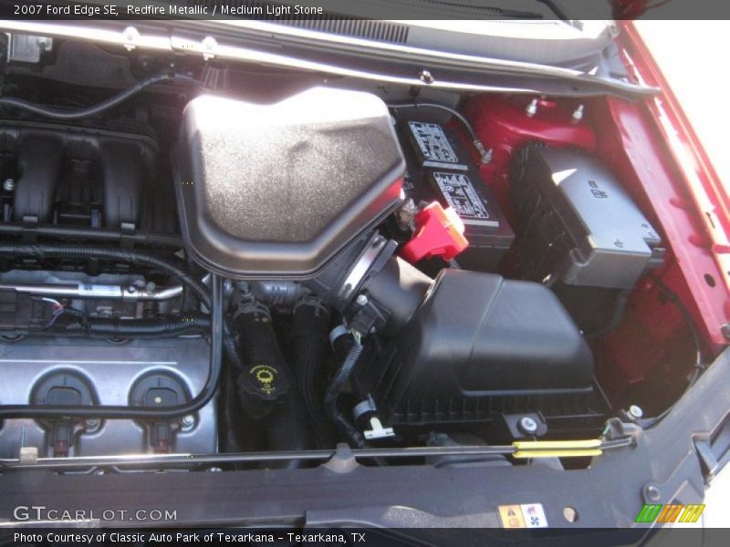 Redfire Metallic / Medium Light Stone 2007 Ford Edge SE