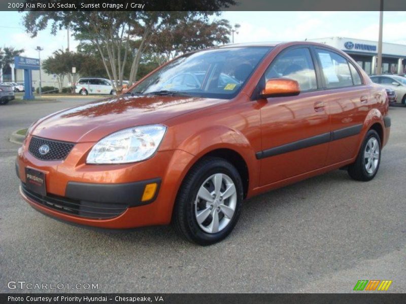  2009 Rio LX Sedan Sunset Orange