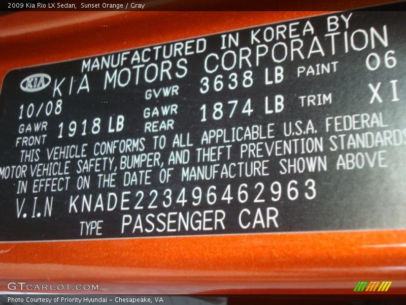2009 Rio LX Sedan Sunset Orange Color Code 06