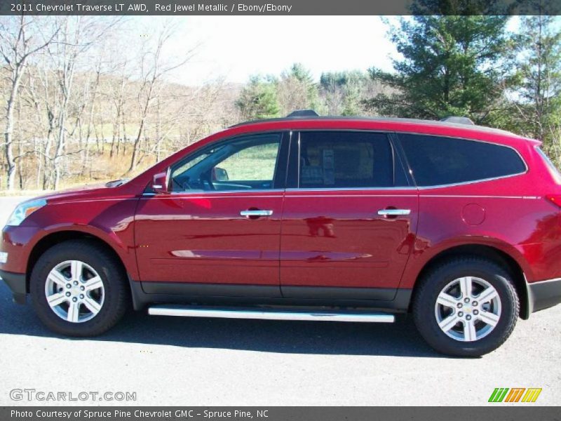 Red Jewel Metallic / Ebony/Ebony 2011 Chevrolet Traverse LT AWD