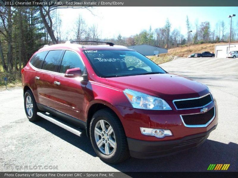 Red Jewel Metallic / Ebony/Ebony 2011 Chevrolet Traverse LT AWD