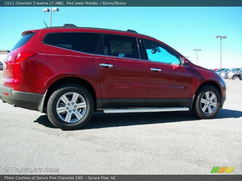 Red Jewel Metallic / Ebony/Ebony 2011 Chevrolet Traverse LT AWD