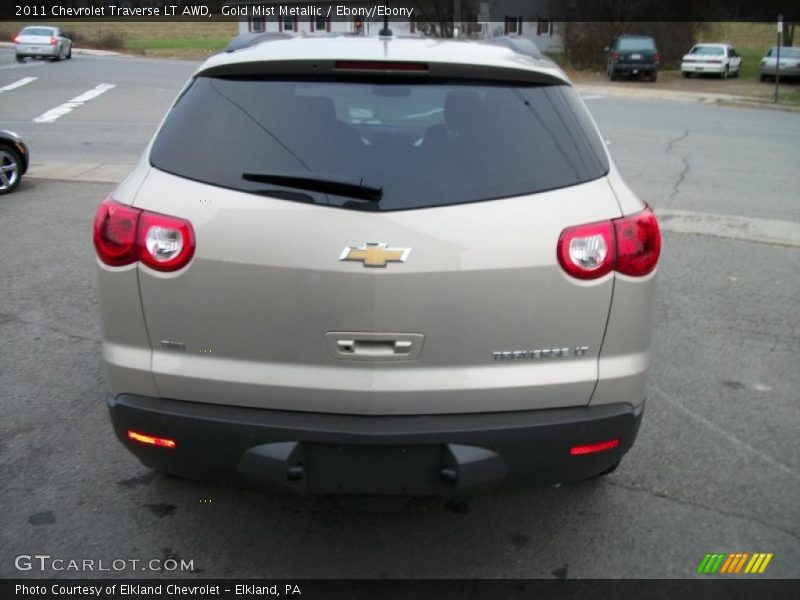 Gold Mist Metallic / Ebony/Ebony 2011 Chevrolet Traverse LT AWD