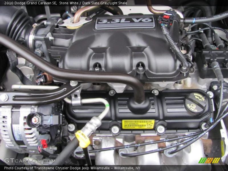 Stone White / Dark Slate Gray/Light Shale 2010 Dodge Grand Caravan SE