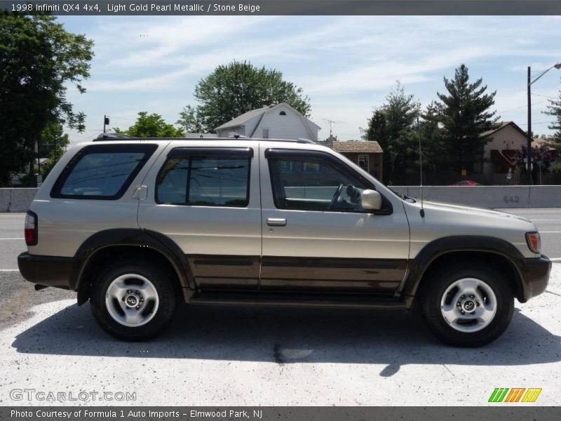 Light Gold Pearl Metallic / Stone Beige 1998 Infiniti QX4 4x4