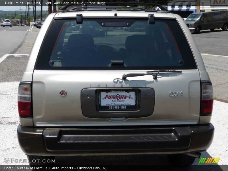Light Gold Pearl Metallic / Stone Beige 1998 Infiniti QX4 4x4