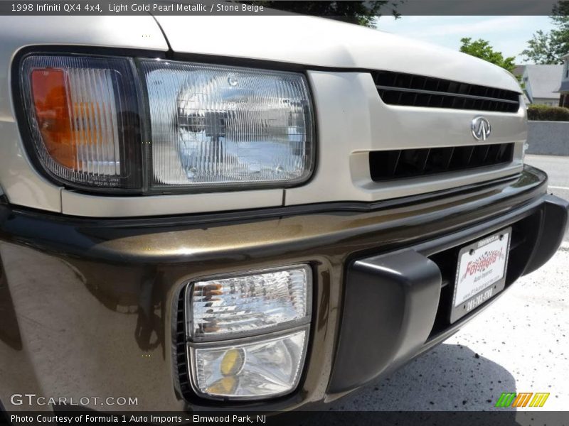 Light Gold Pearl Metallic / Stone Beige 1998 Infiniti QX4 4x4