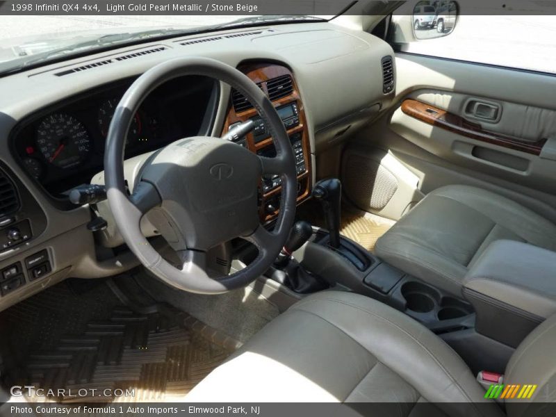 Light Gold Pearl Metallic / Stone Beige 1998 Infiniti QX4 4x4
