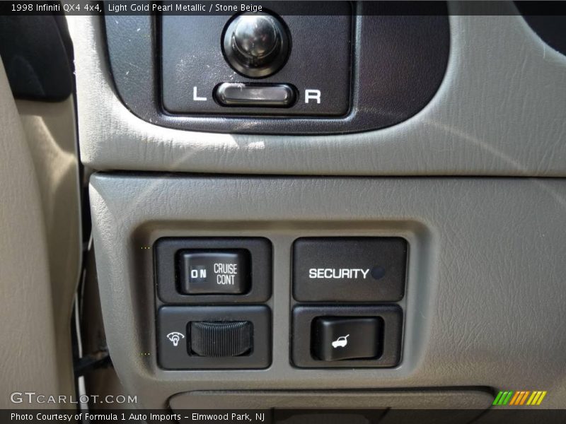 Light Gold Pearl Metallic / Stone Beige 1998 Infiniti QX4 4x4