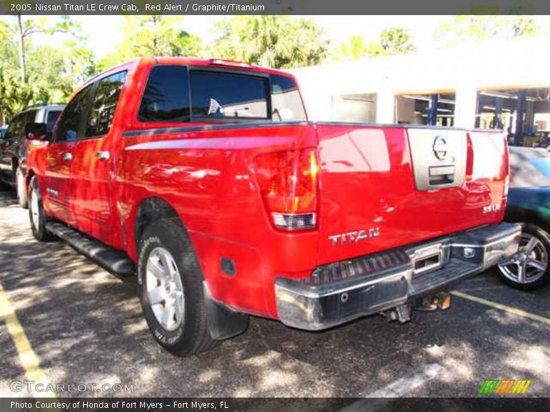 Red Alert / Graphite/Titanium 2005 Nissan Titan LE Crew Cab
