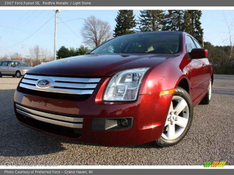 Redfire Metallic / Light Stone 2007 Ford Fusion SE