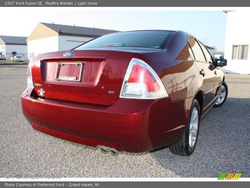 Redfire Metallic / Light Stone 2007 Ford Fusion SE