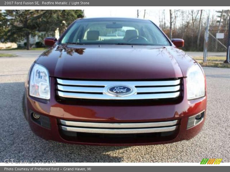 Redfire Metallic / Light Stone 2007 Ford Fusion SE