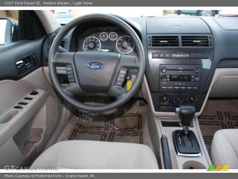 Redfire Metallic / Light Stone 2007 Ford Fusion SE