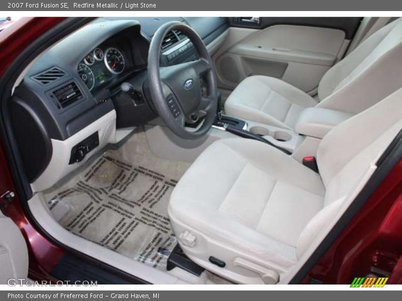 Redfire Metallic / Light Stone 2007 Ford Fusion SE