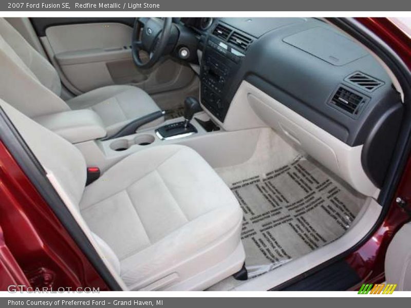 Redfire Metallic / Light Stone 2007 Ford Fusion SE