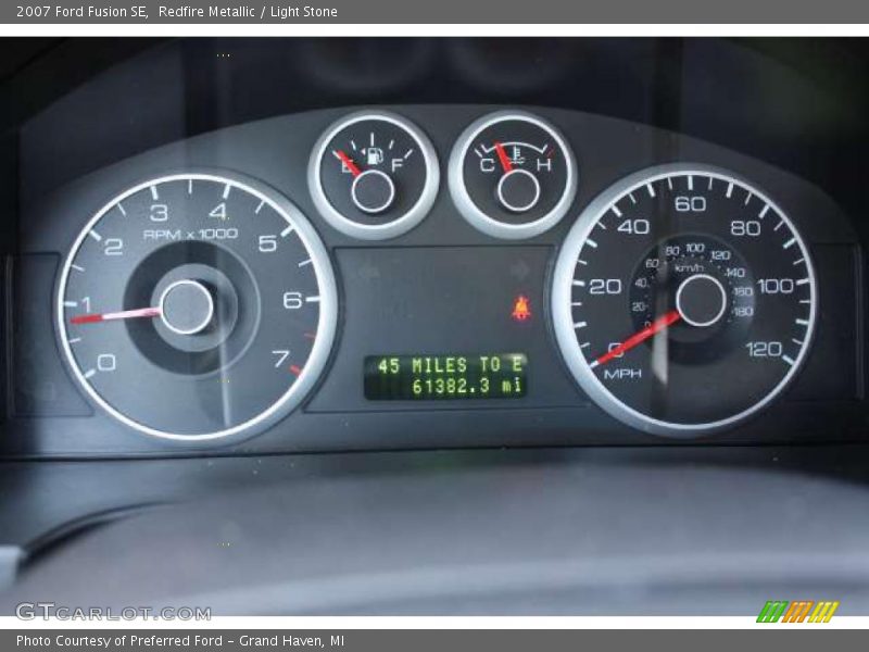 Redfire Metallic / Light Stone 2007 Ford Fusion SE