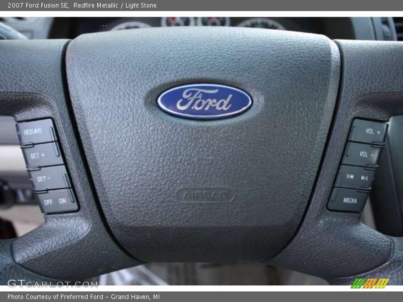 Redfire Metallic / Light Stone 2007 Ford Fusion SE
