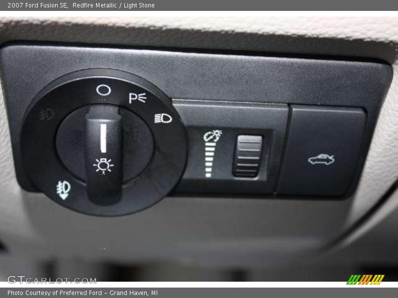 Redfire Metallic / Light Stone 2007 Ford Fusion SE