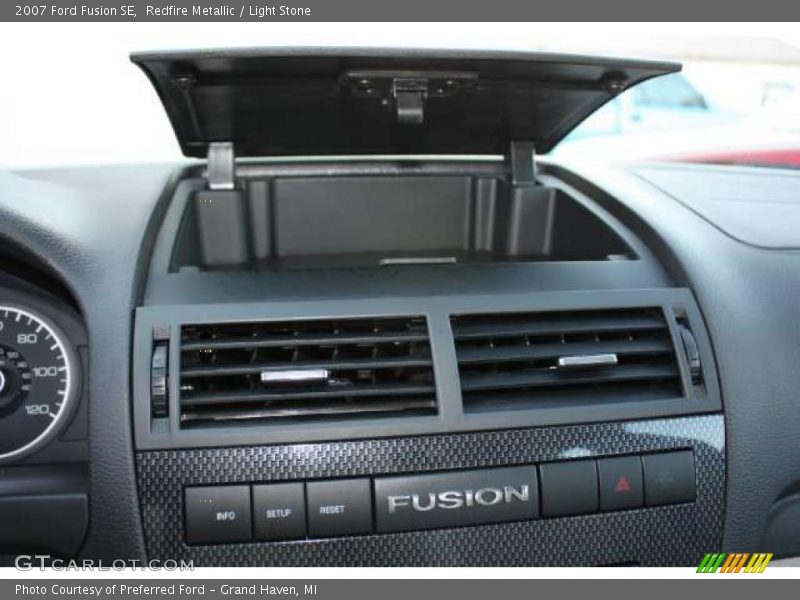 Redfire Metallic / Light Stone 2007 Ford Fusion SE
