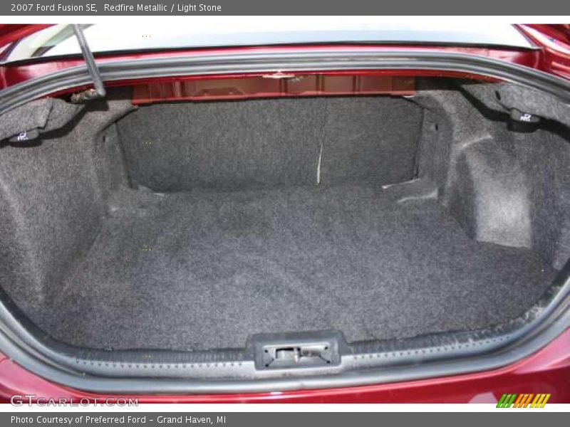 Redfire Metallic / Light Stone 2007 Ford Fusion SE