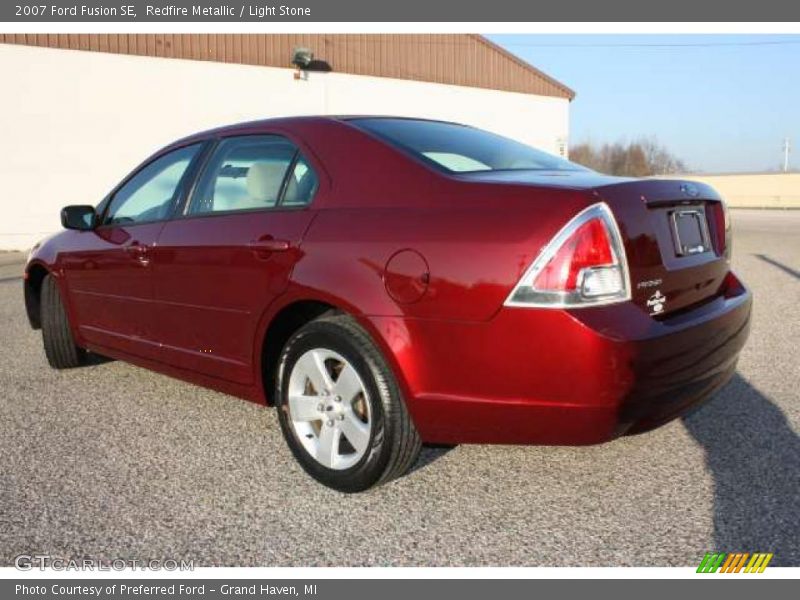 Redfire Metallic / Light Stone 2007 Ford Fusion SE