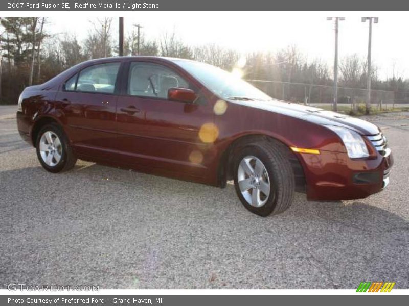 Redfire Metallic / Light Stone 2007 Ford Fusion SE