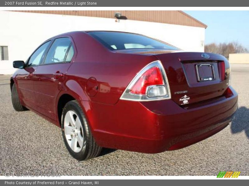 Redfire Metallic / Light Stone 2007 Ford Fusion SE