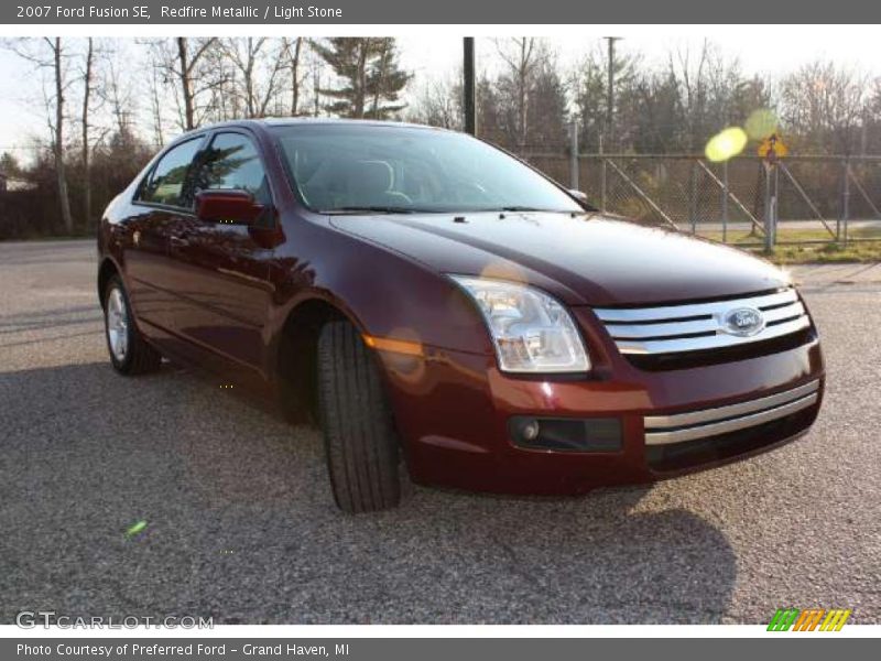 Redfire Metallic / Light Stone 2007 Ford Fusion SE