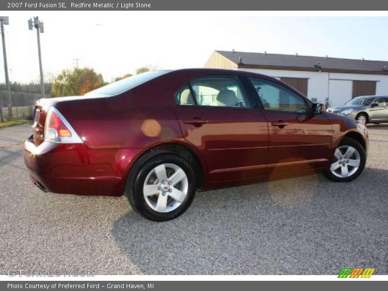 Redfire Metallic / Light Stone 2007 Ford Fusion SE