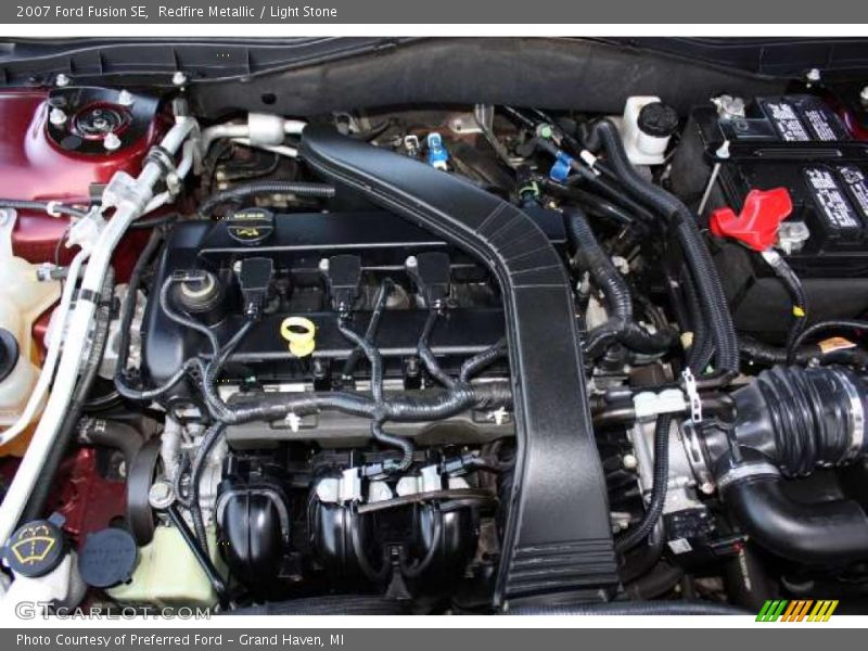 Redfire Metallic / Light Stone 2007 Ford Fusion SE