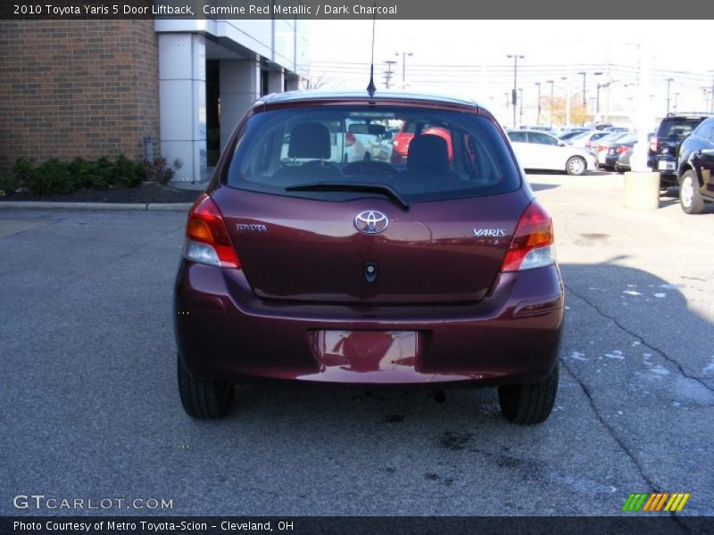 Carmine Red Metallic / Dark Charcoal 2010 Toyota Yaris 5 Door Liftback