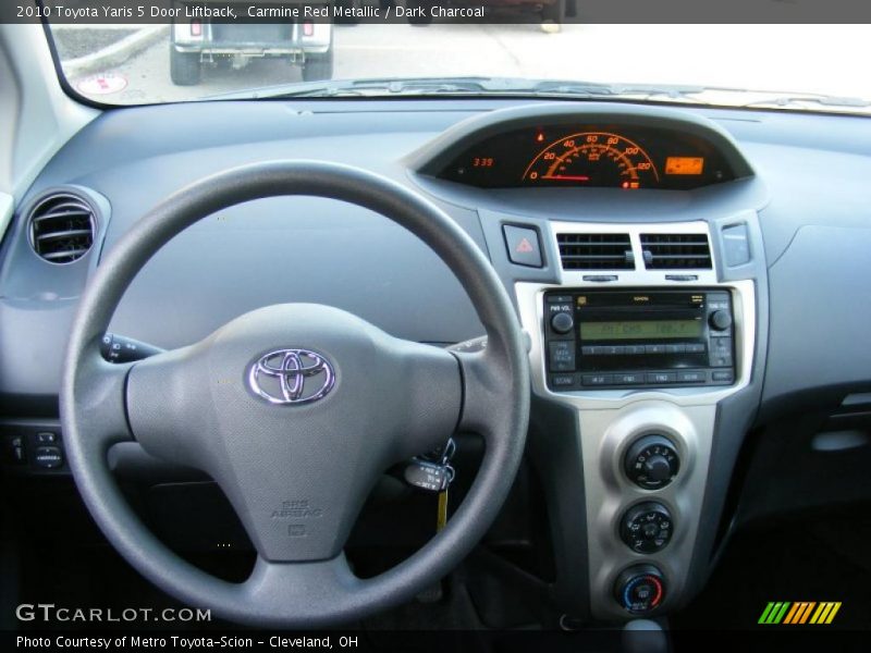 Carmine Red Metallic / Dark Charcoal 2010 Toyota Yaris 5 Door Liftback