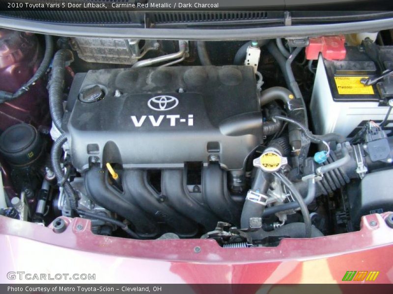 Carmine Red Metallic / Dark Charcoal 2010 Toyota Yaris 5 Door Liftback