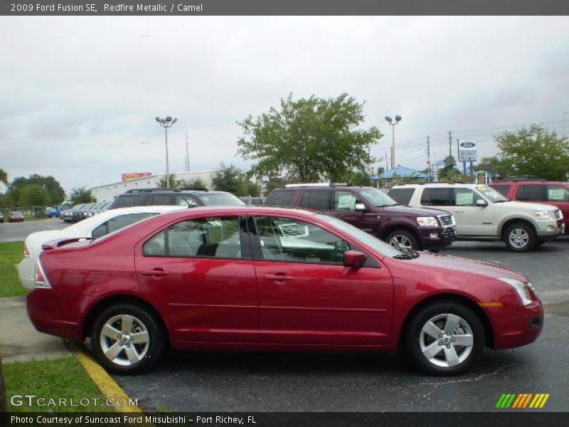 Redfire Metallic / Camel 2009 Ford Fusion SE