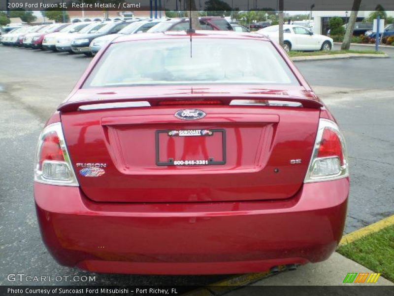 Redfire Metallic / Camel 2009 Ford Fusion SE